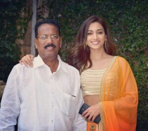 With Her Father